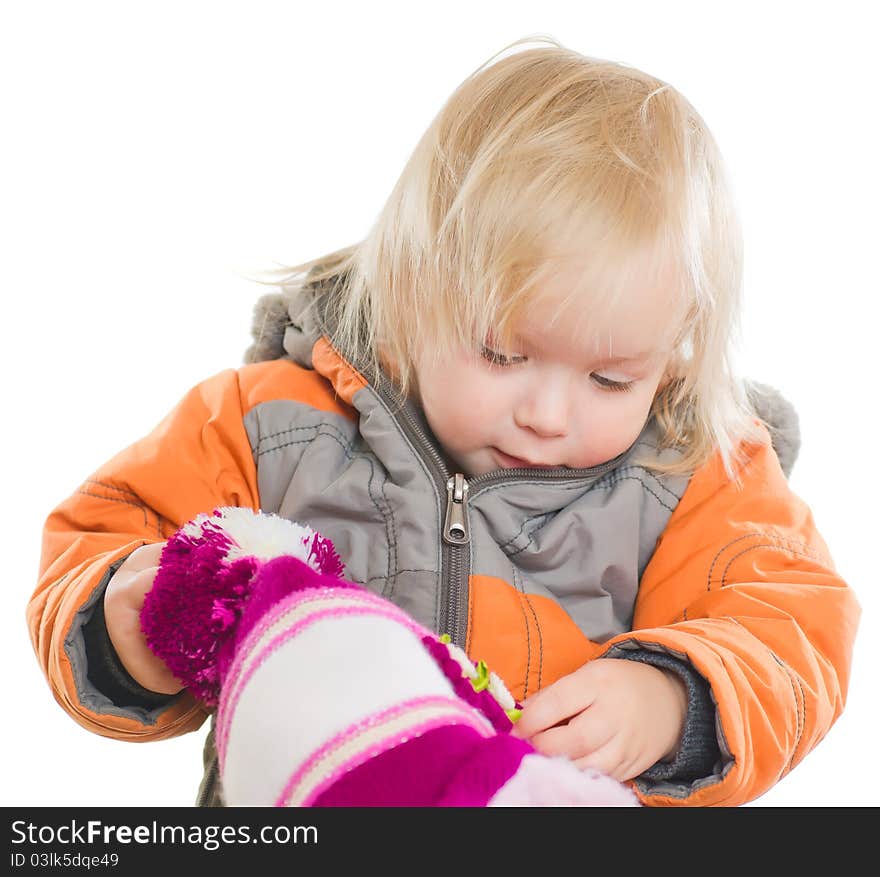 Adorable toddler girl dressing winter jacket and hat. Adorable toddler girl dressing winter jacket and hat