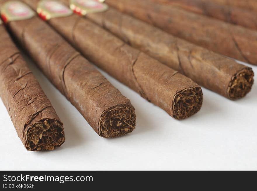 Row of Cigars, Symbol for Luxury but also medical difficulties and healthcare Problems