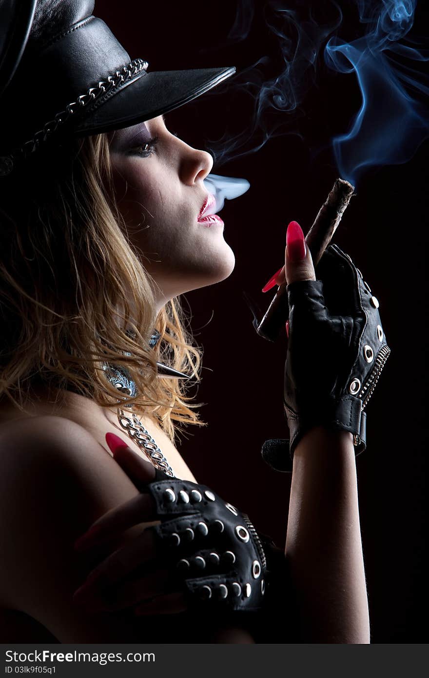 Beautiful girl with a cigar