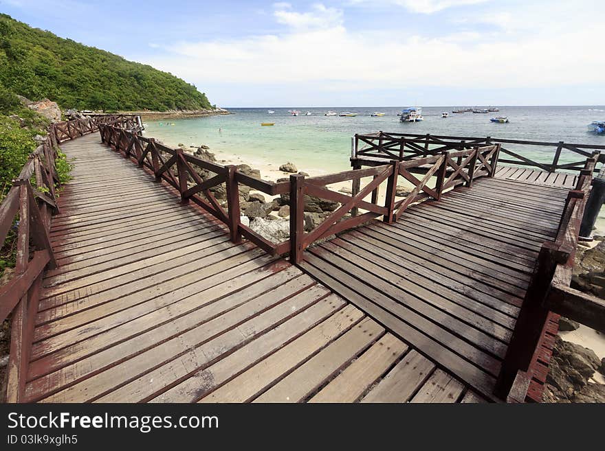 Wooden Bridge on turquoise seascape