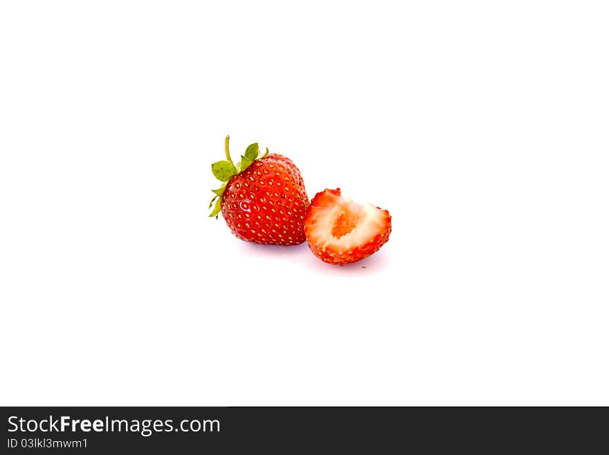 The red strawberry on white