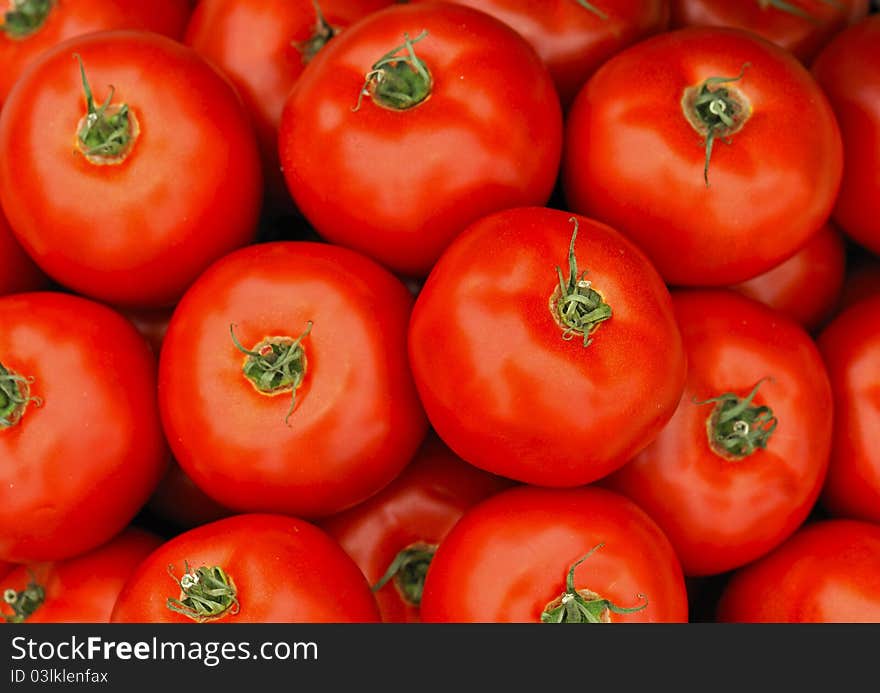 Background of fresh ripe red tomatoes