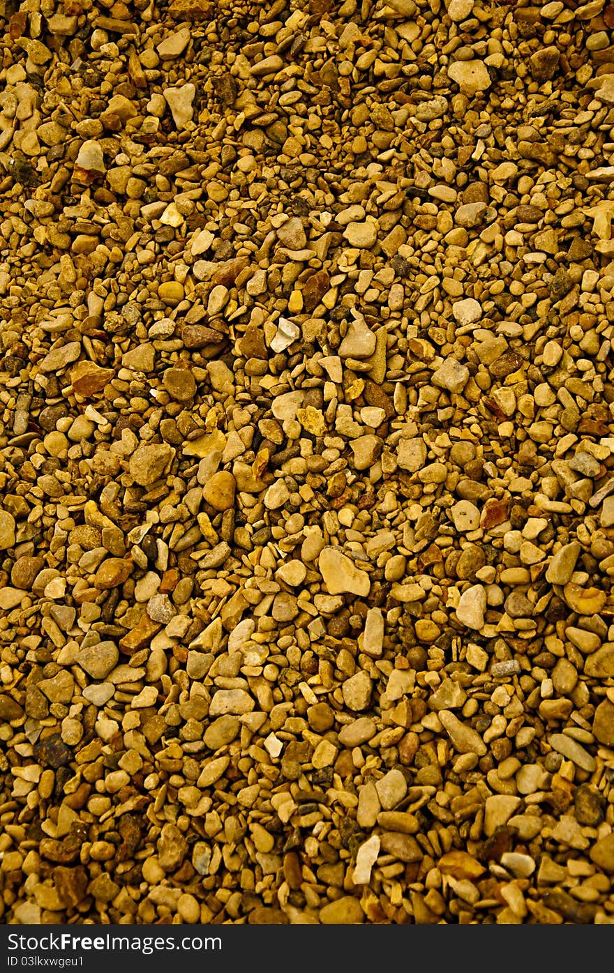 Small stones on a beach in summer. Small stones on a beach in summer