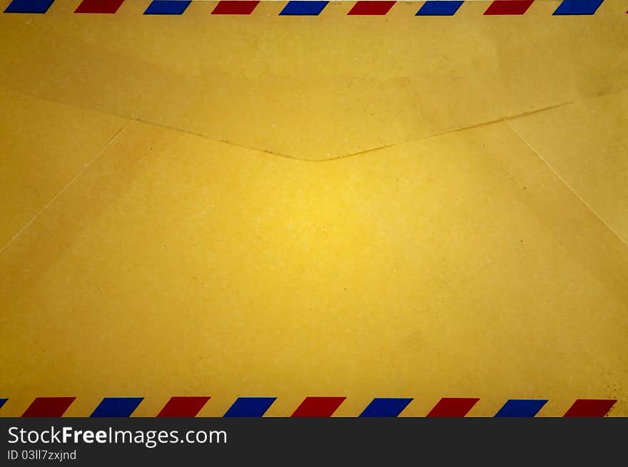 Old vintage style envelope with red and blue path. Old vintage style envelope with red and blue path