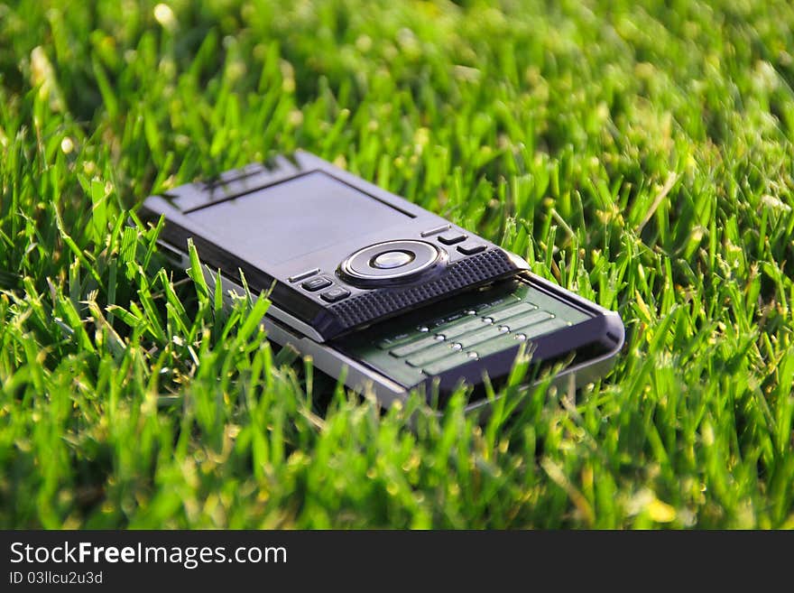 Mobile phone on the grass