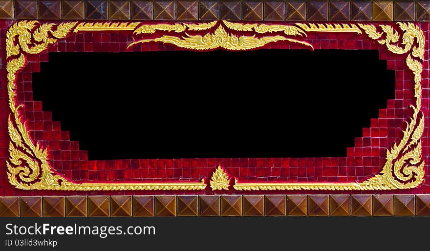 Stucco frame golden of thai in the brick-red. Stucco frame golden of thai in the brick-red.