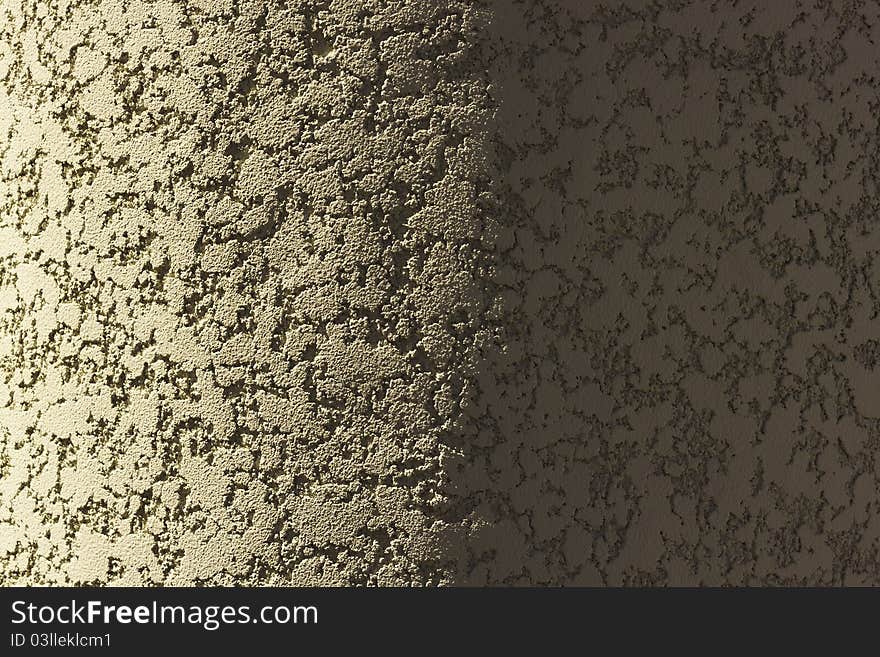 The texture of the plastered walls. Gray-white, semi-circular, half in shadow. The texture of the plastered walls. Gray-white, semi-circular, half in shadow