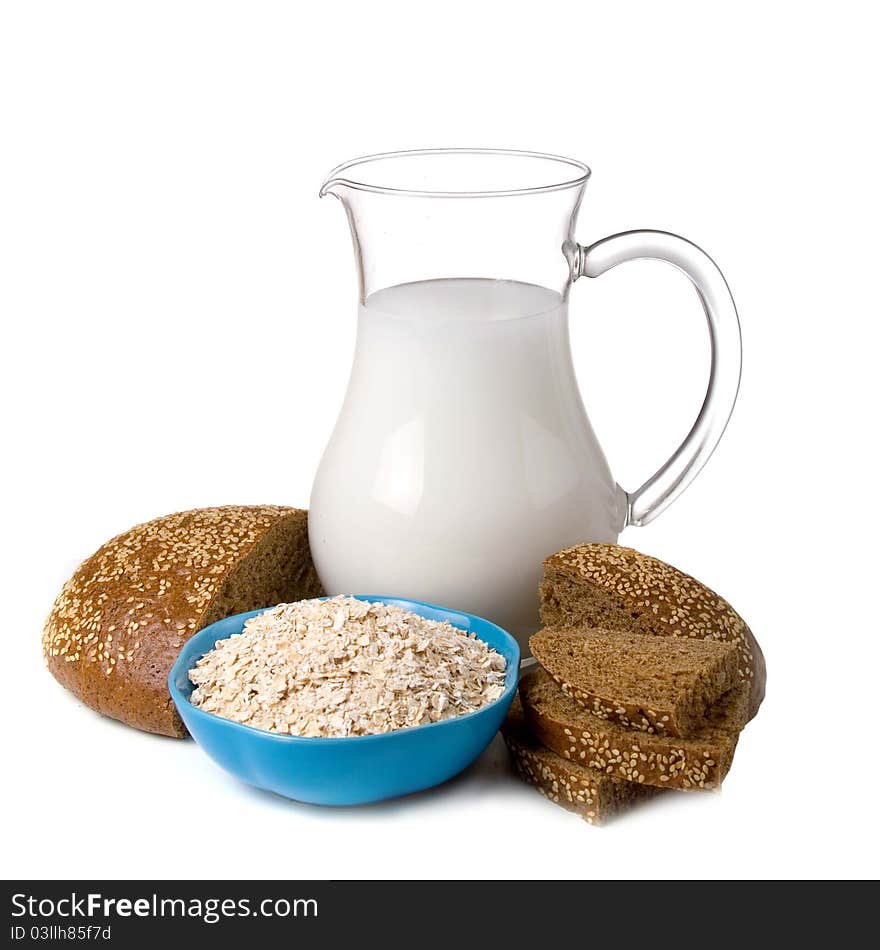 Milk and bread isolated on a white background