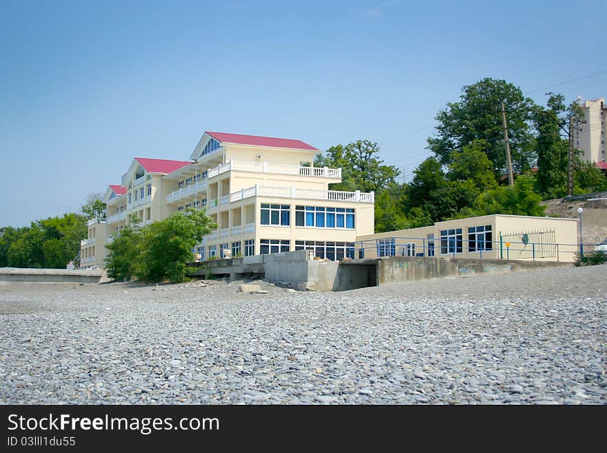 Abstract scene with hotel on the sea beach. Abstract scene with hotel on the sea beach