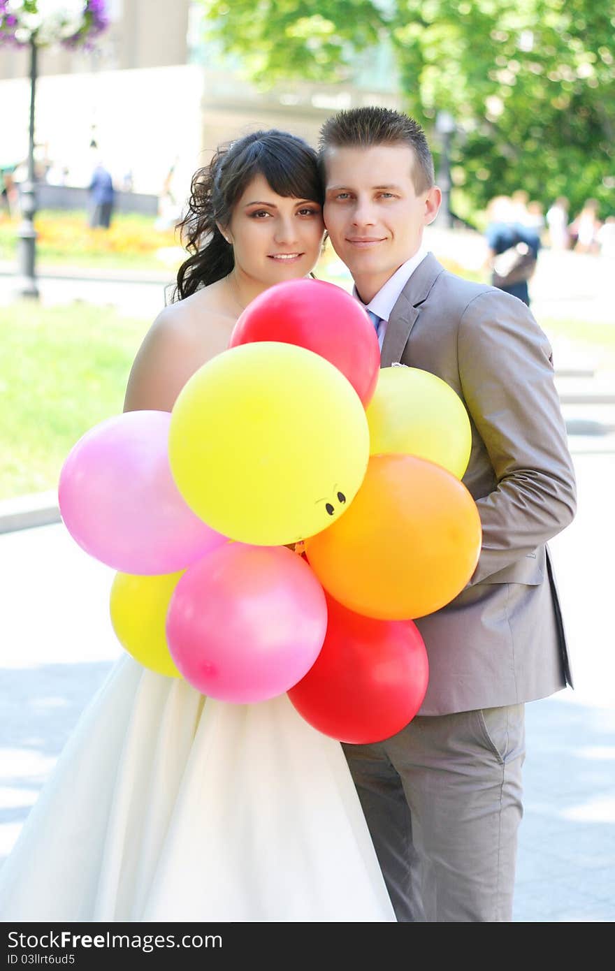 The bride and groom outdoors