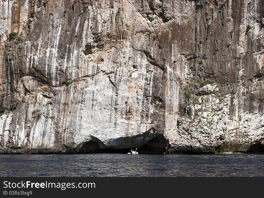 Boat close to mountain wall and The Mediterranean Sea on Majorca, Spain. Boat close to mountain wall and The Mediterranean Sea on Majorca, Spain.