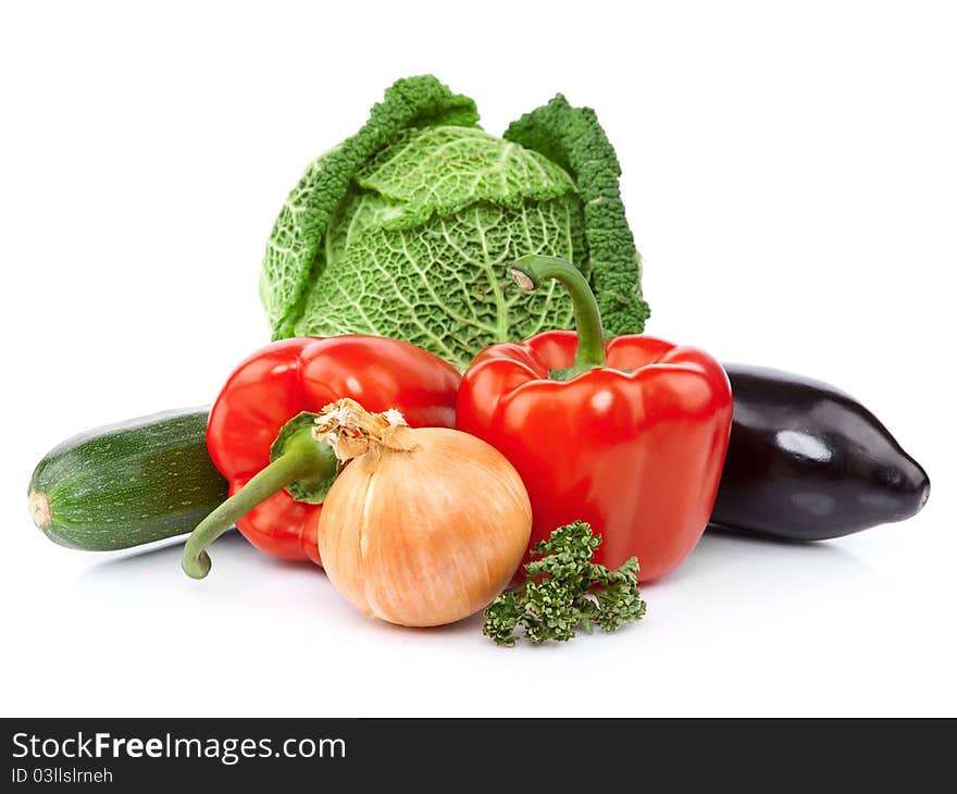 Composition with variety of raw fresh organic vegetables. Isolated over white background. Composition with variety of raw fresh organic vegetables. Isolated over white background