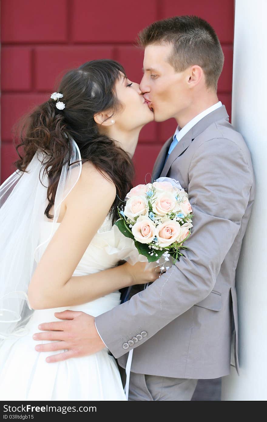 The bride and groom outdoors