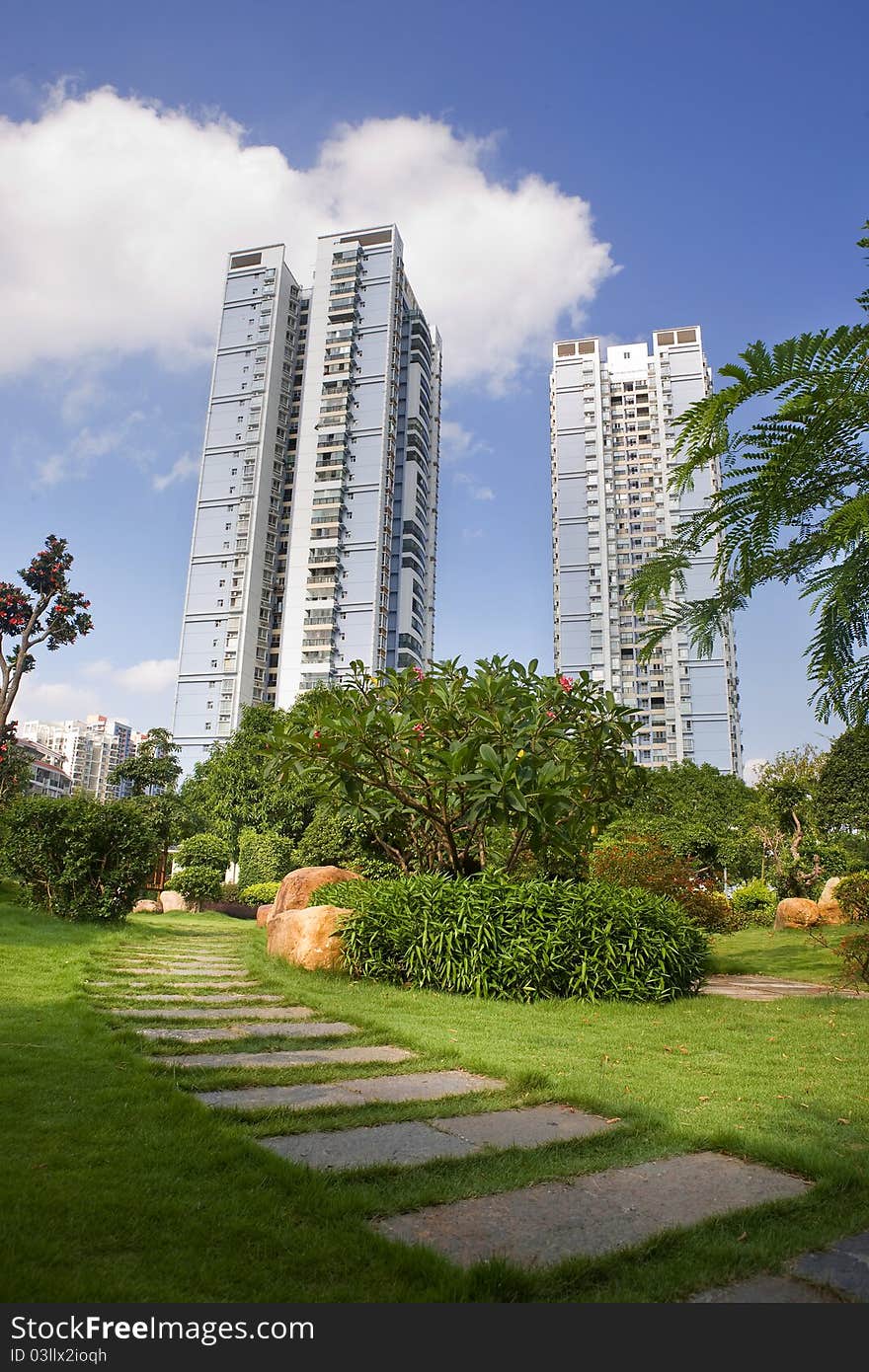 Stone path in park leading to city