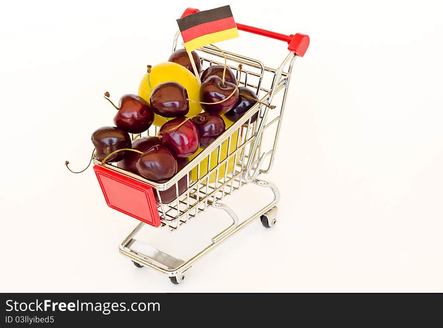 Shopping cart with plum and cherry