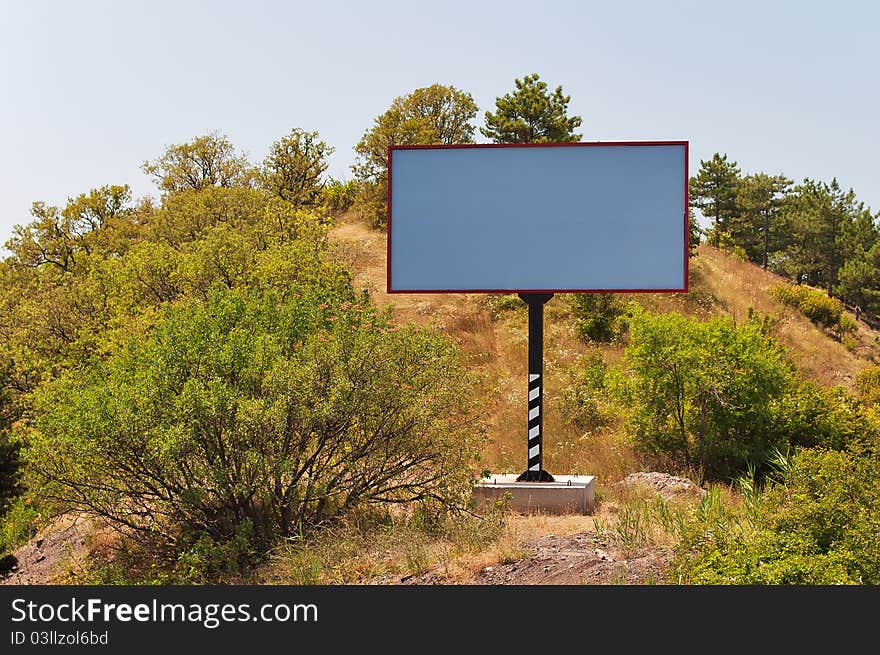 Empty billboard on the side of the road Yalta-Sevastopol in the Crimea, Ukraine