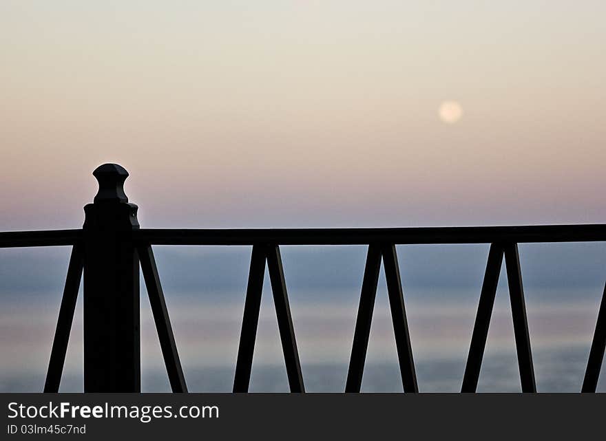 Fence and sunrise in background, pricture taken on Mount Athos. Fence and sunrise in background, pricture taken on Mount Athos