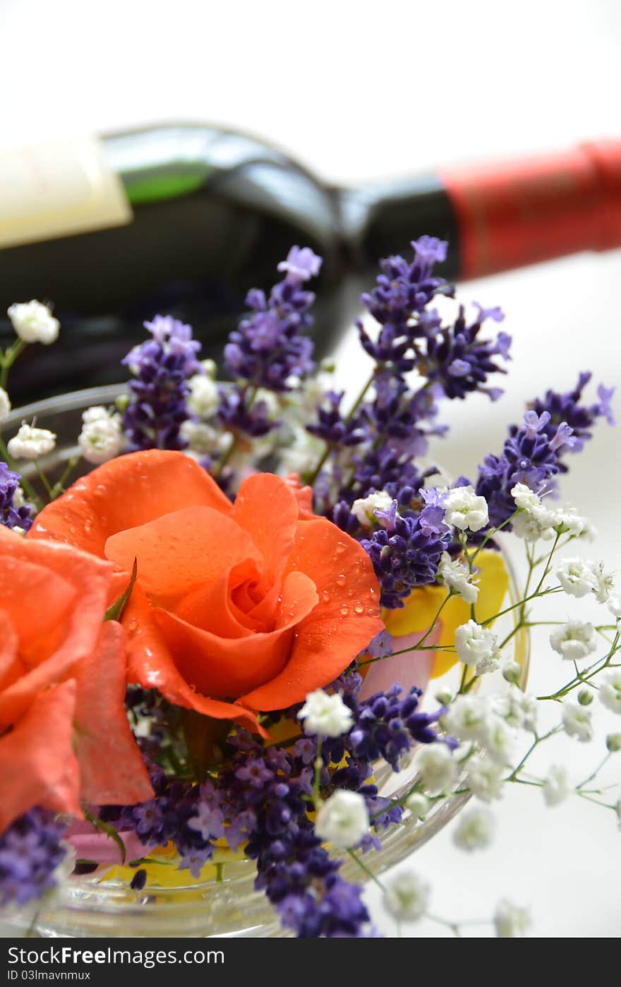 Rose flower and red wine