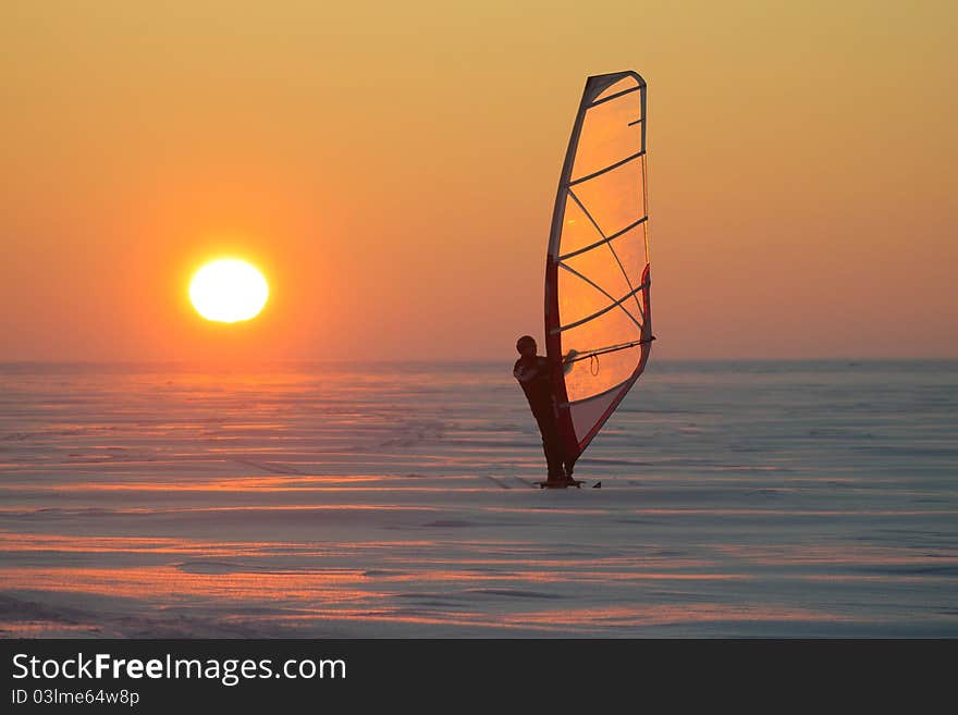 Ice sailor at sunset