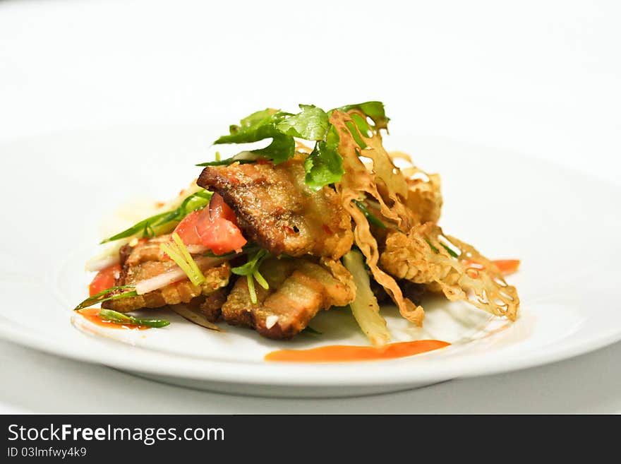 Crispy pork with spicy sauce. Crispy pork with spicy sauce