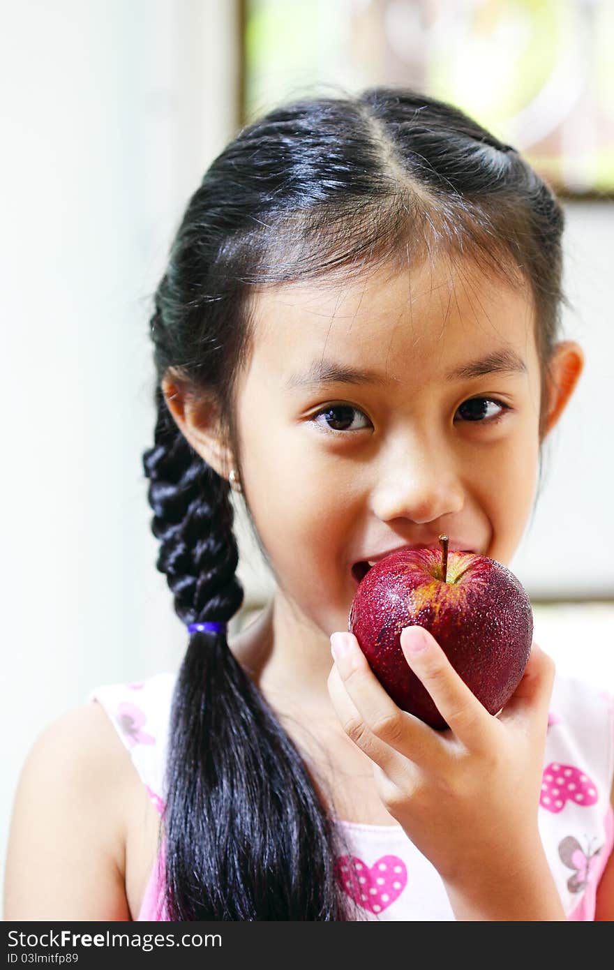 Young Girl With Apple