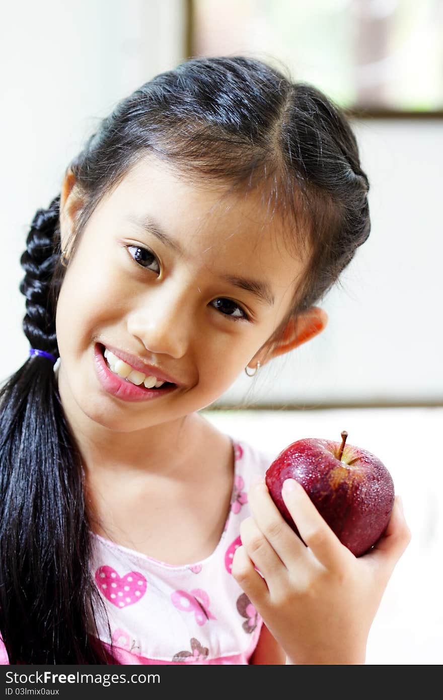 Young Girl With Apple