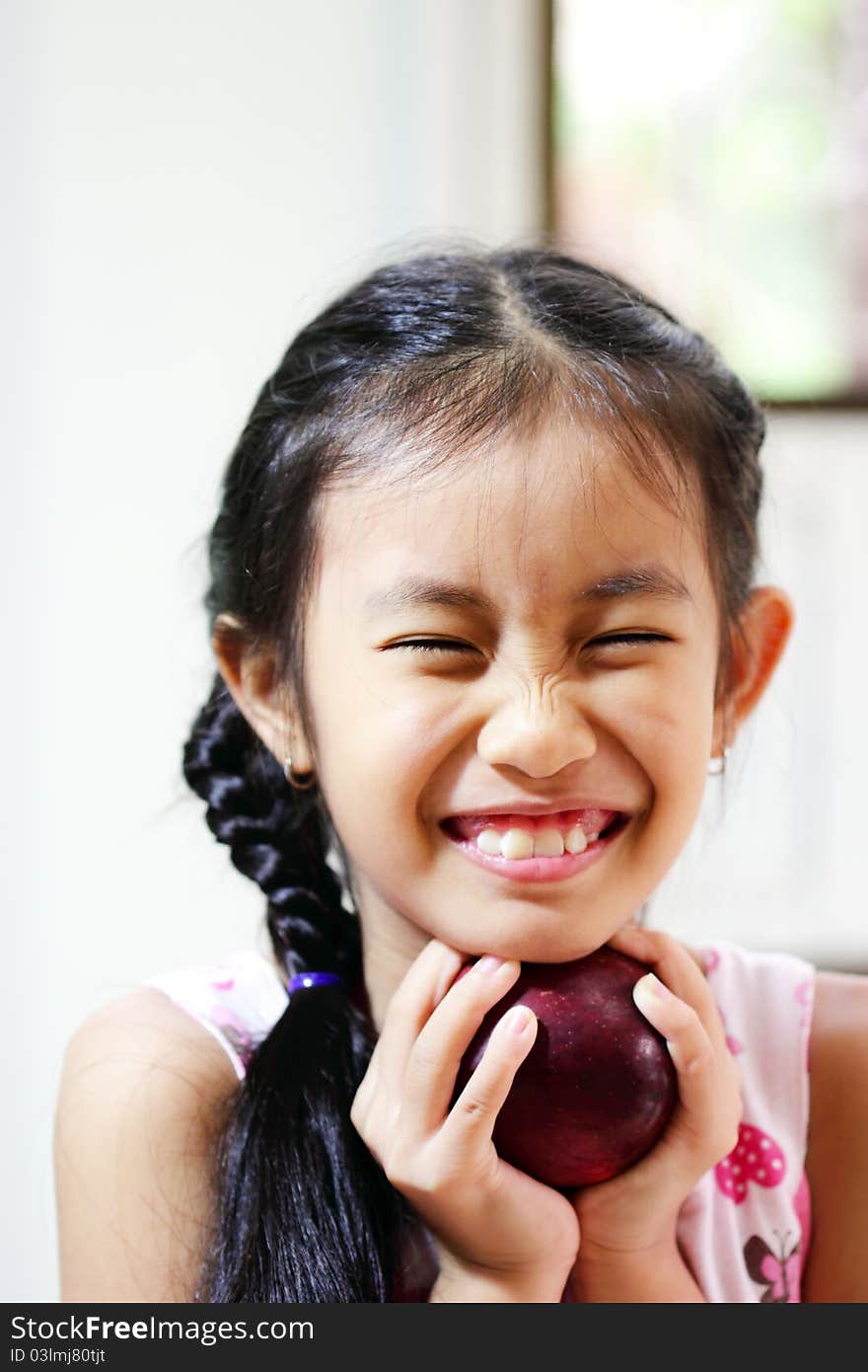 Young Girl With Apple