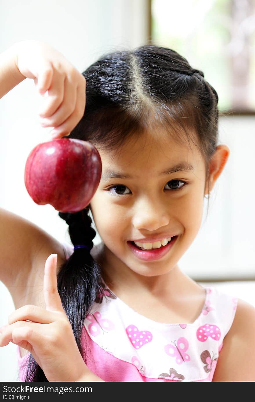 Young Girl With Apple