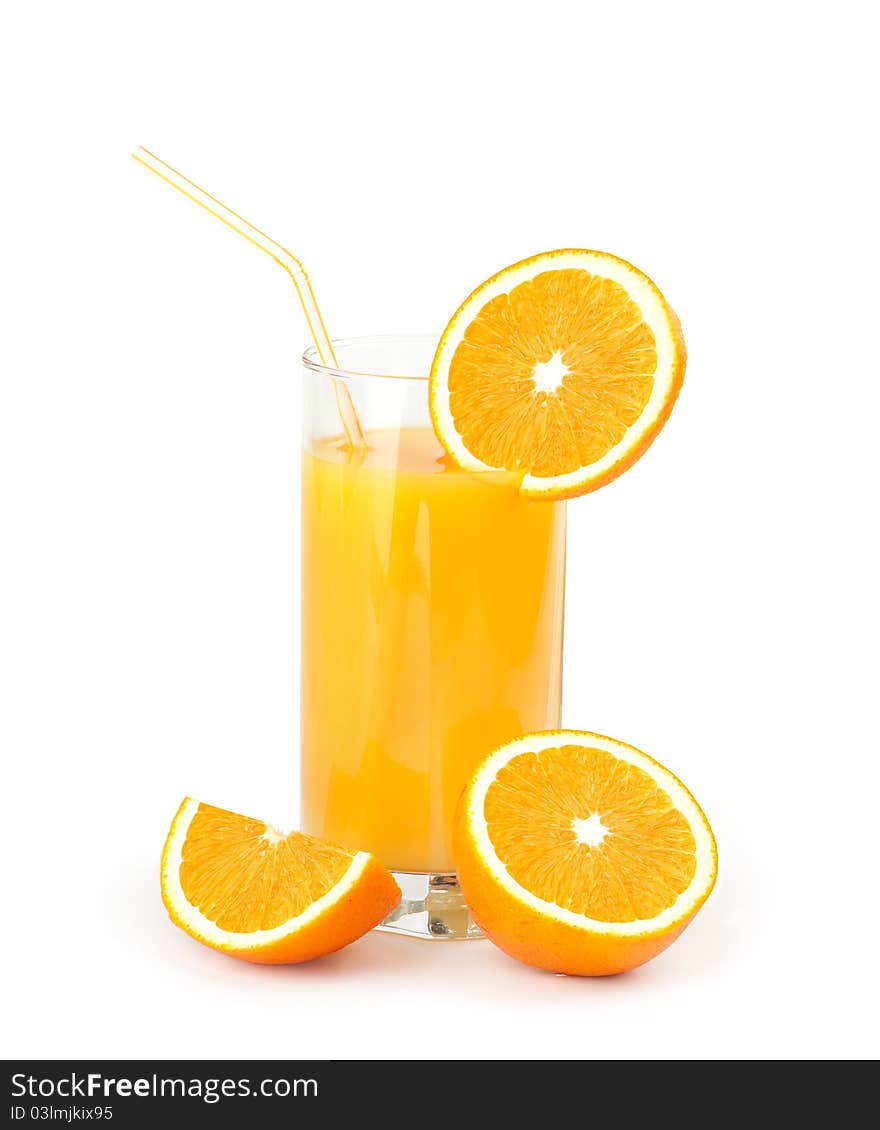 Orange juice with slices of orange in the glass isolated on white