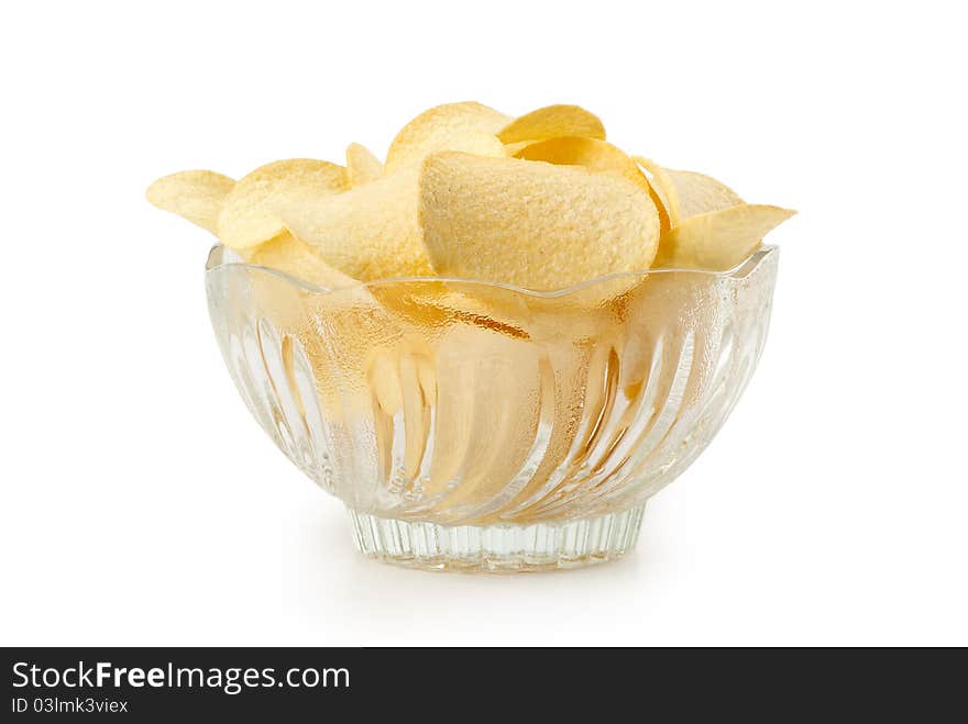 Delicious potato chips in white bowl