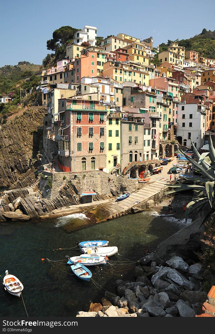 Riomaggiore, one of the stunningly beautiful  Italian Cinque Terre villages and a UNESCO world heritage site. Riomaggiore, one of the stunningly beautiful  Italian Cinque Terre villages and a UNESCO world heritage site.