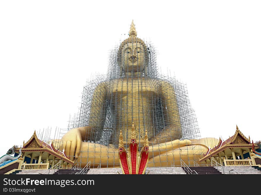 Biggest golden buddha statue image outdoor in Temple Thailand under renovate