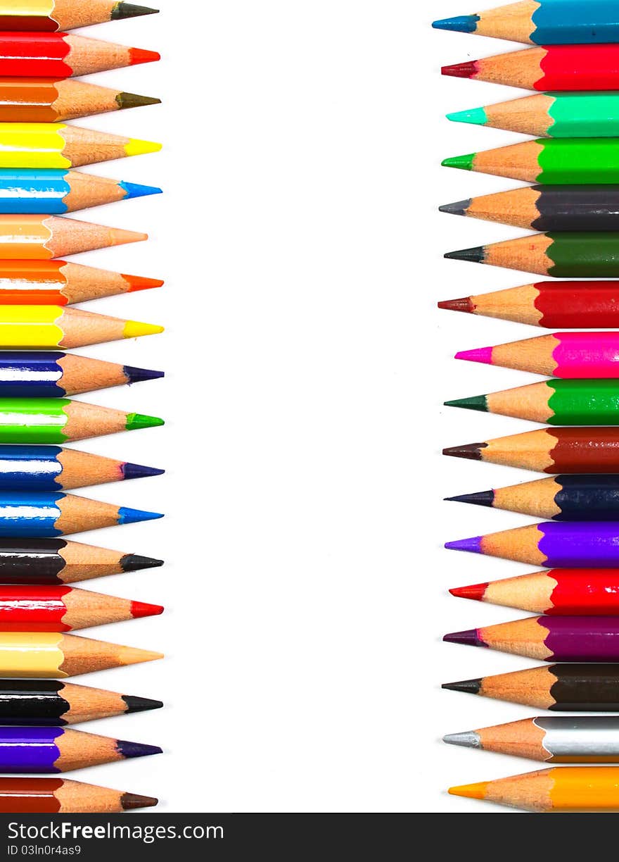 Close up of color pencils with different color over white background