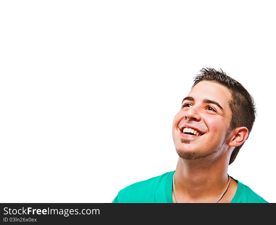 Young man with green t-shirt smiling. Very candid picture. Young man with green t-shirt smiling. Very candid picture.