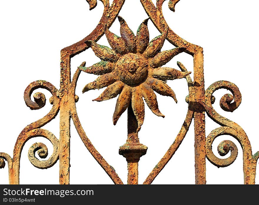 Rusty ornamental iron fence detail isolated on white. Rusty ornamental iron fence detail isolated on white