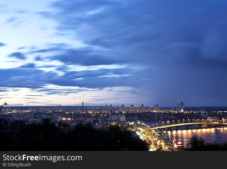 Night cityscape with havansky bridge in Kyiv