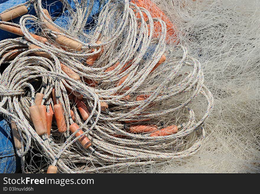 Close-up of fishing net and floats background