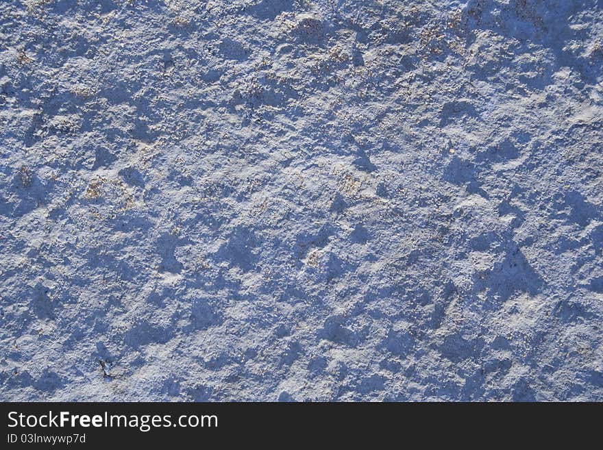 Blue stone texture of a beach pier. Blue stone texture of a beach pier