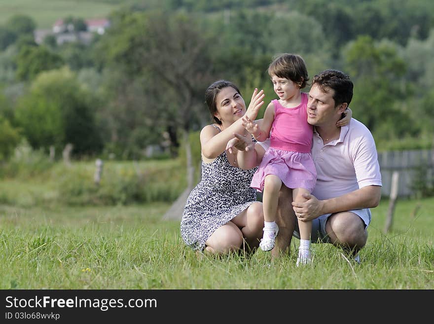 Cheerful family relaxing in nature