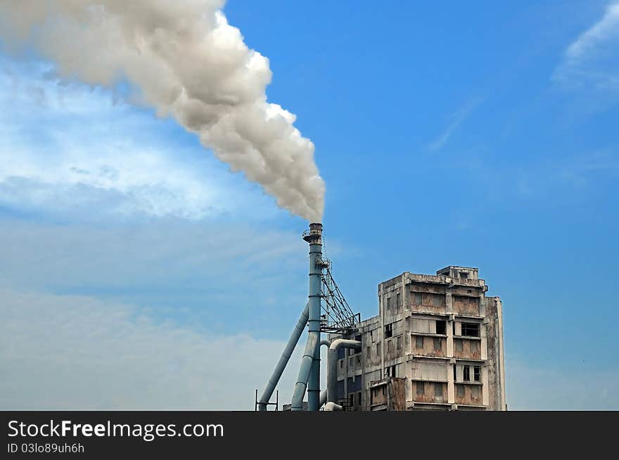 An old factory emitting hazadarous gases into the environment. An old factory emitting hazadarous gases into the environment