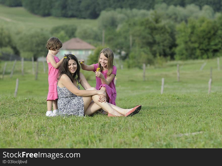 Beautiful girls creating wreath