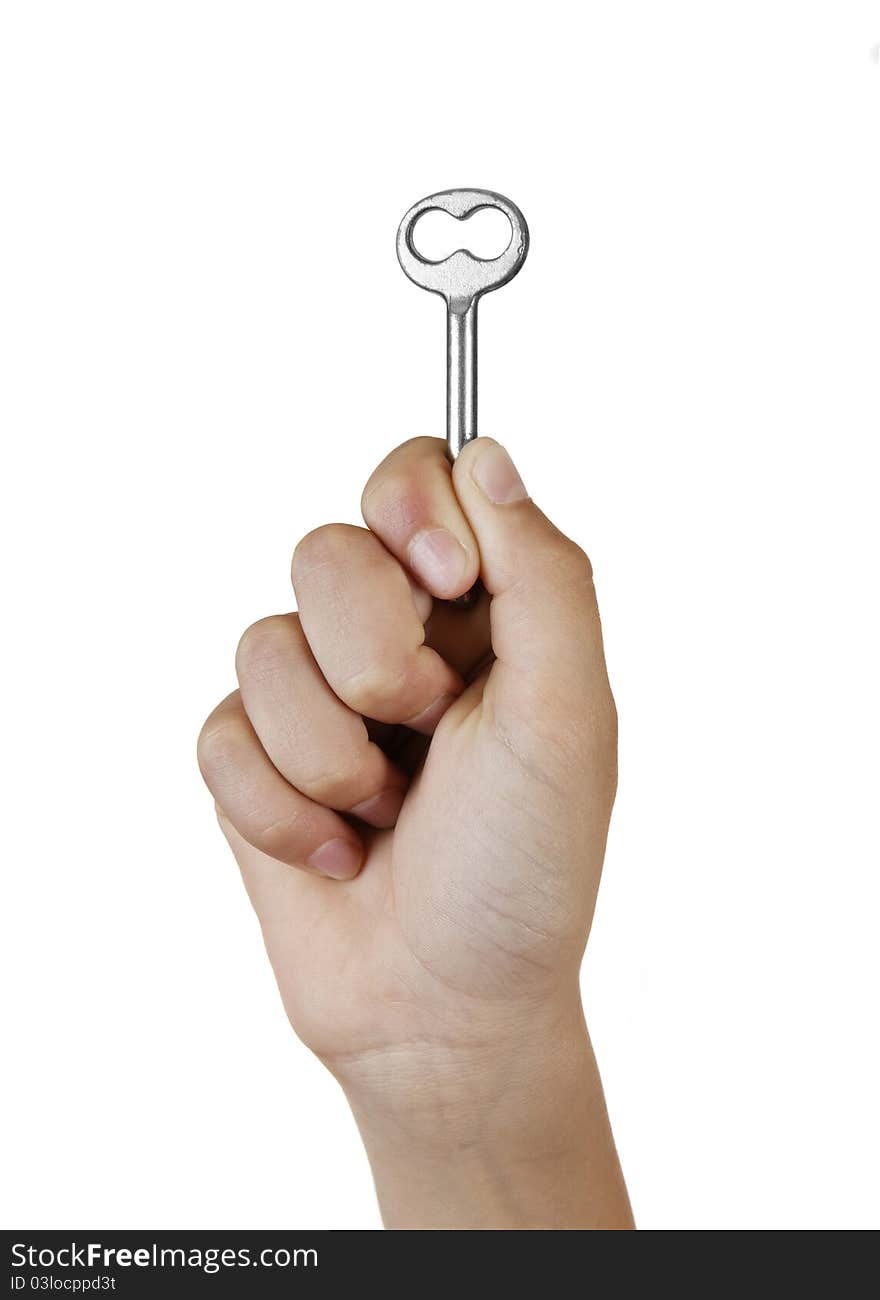 Hand holding key. isolated on white background