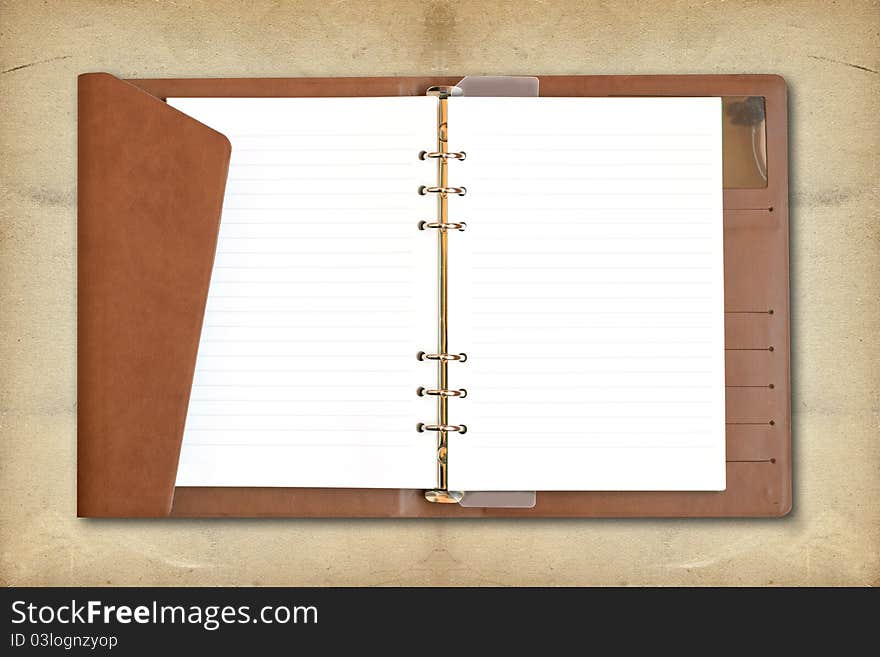 Blank Spiral Notebook on vintage background