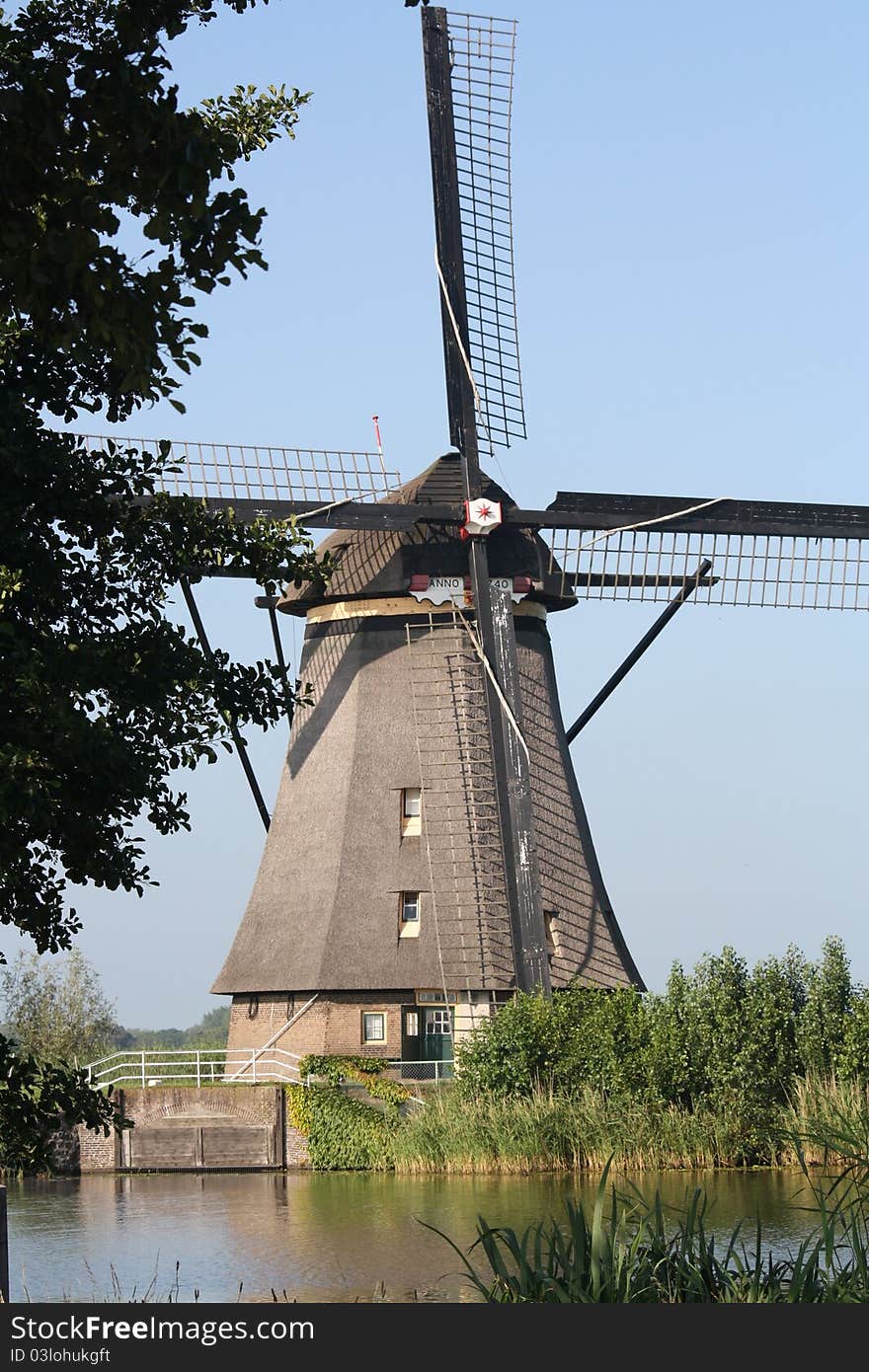 One of the famous windmills from the world heritage area in Kinderdijk, the Netherlands. One of the famous windmills from the world heritage area in Kinderdijk, the Netherlands