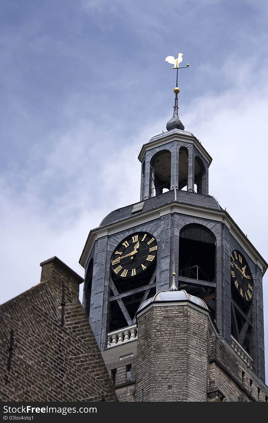 The sint Gertrudius church with a stately rooster in the top