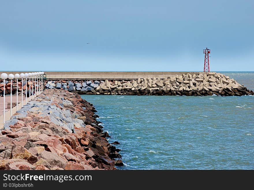 Wave breaker at the canal entrance of Piriapolis marina, Uruguay