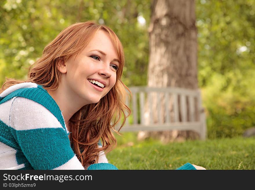 Pretty girl smiling in the park