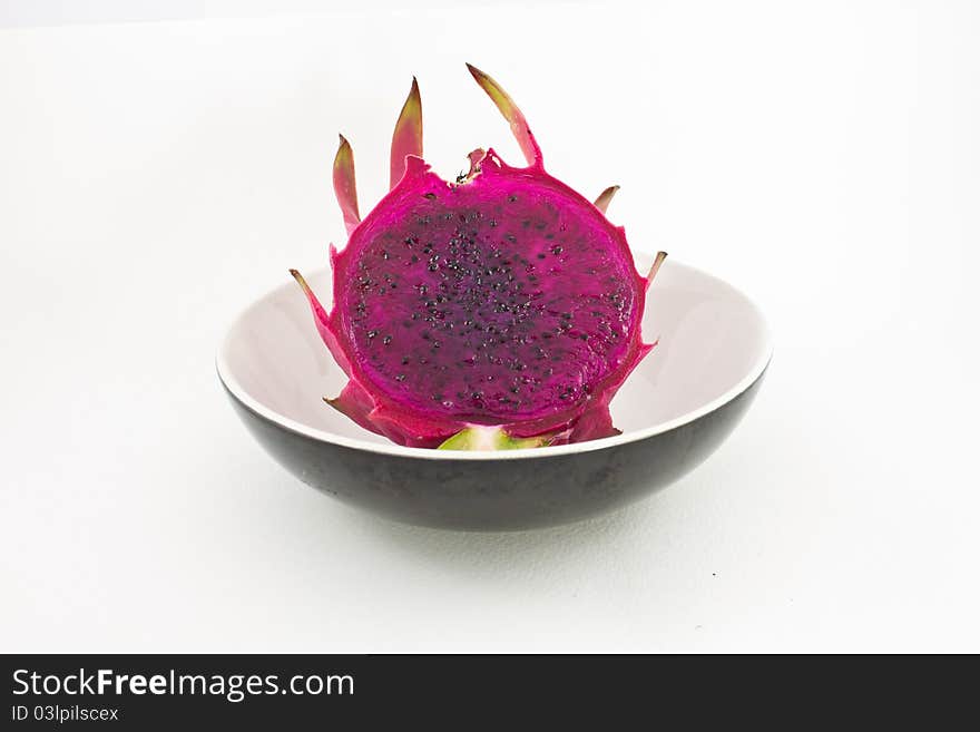 Red organic dragon fruit in cup