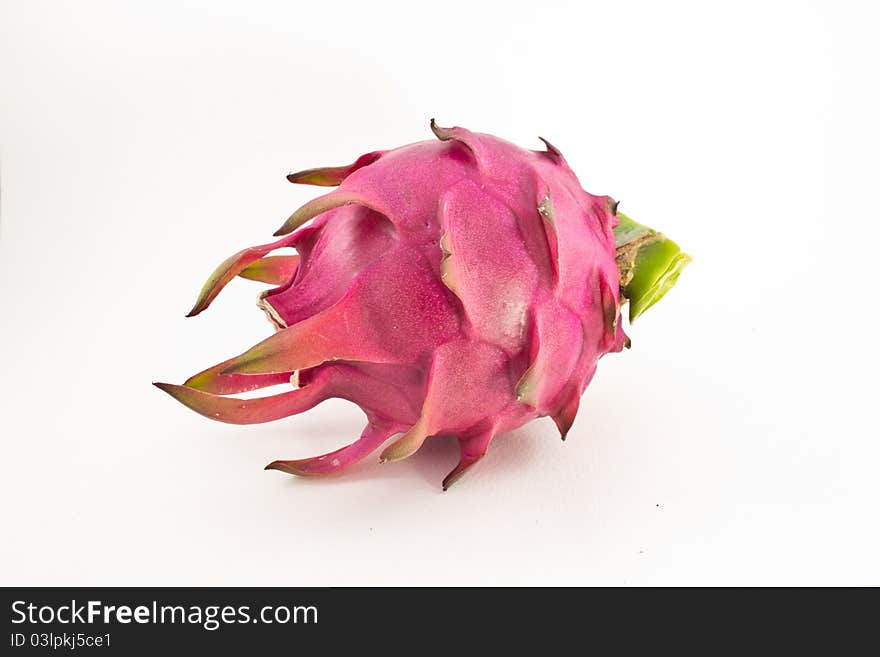 Red organic dragon fruit on white background