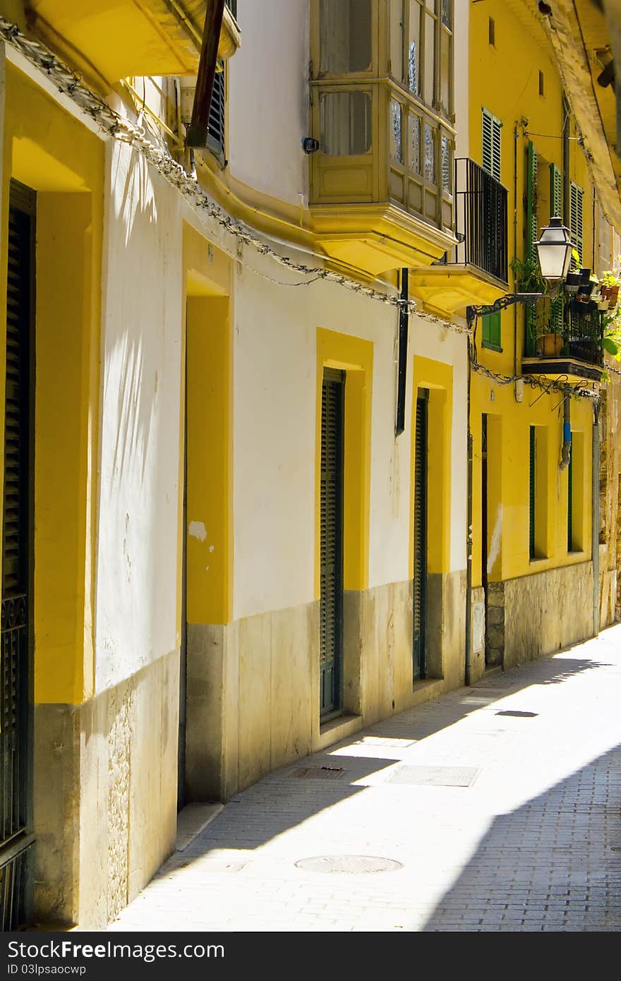 Alleyway in a back street of Palma city. Alleyway in a back street of Palma city